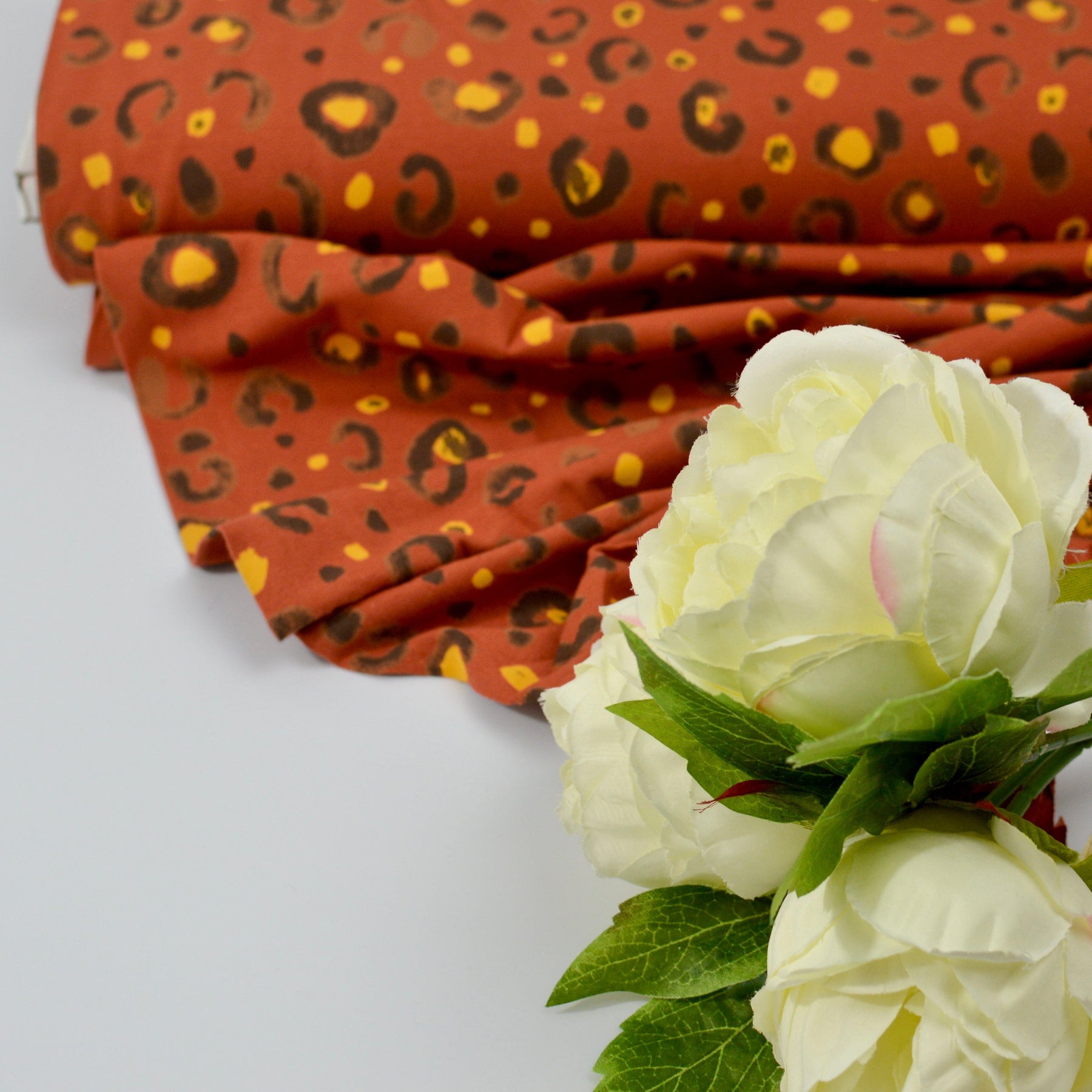 Baumwolljersey - Leomuster rostrot Fabric poshpinks