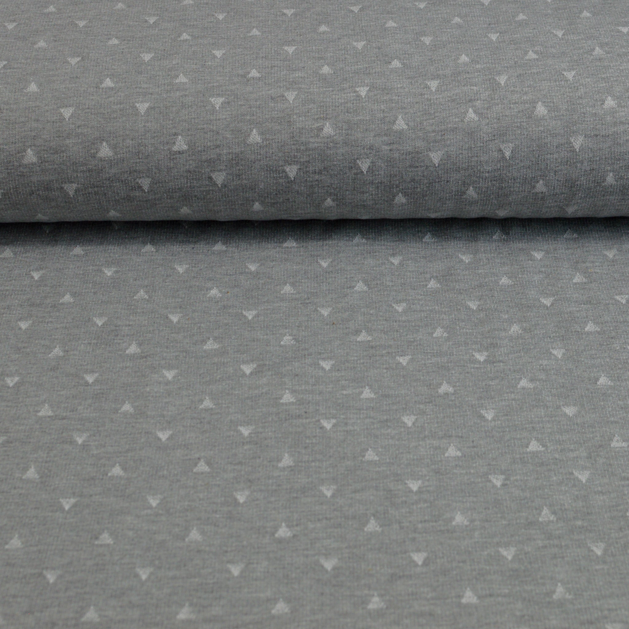 Jacquard Strick - grau mit kleinen Dreiecken Fabric poshpinks