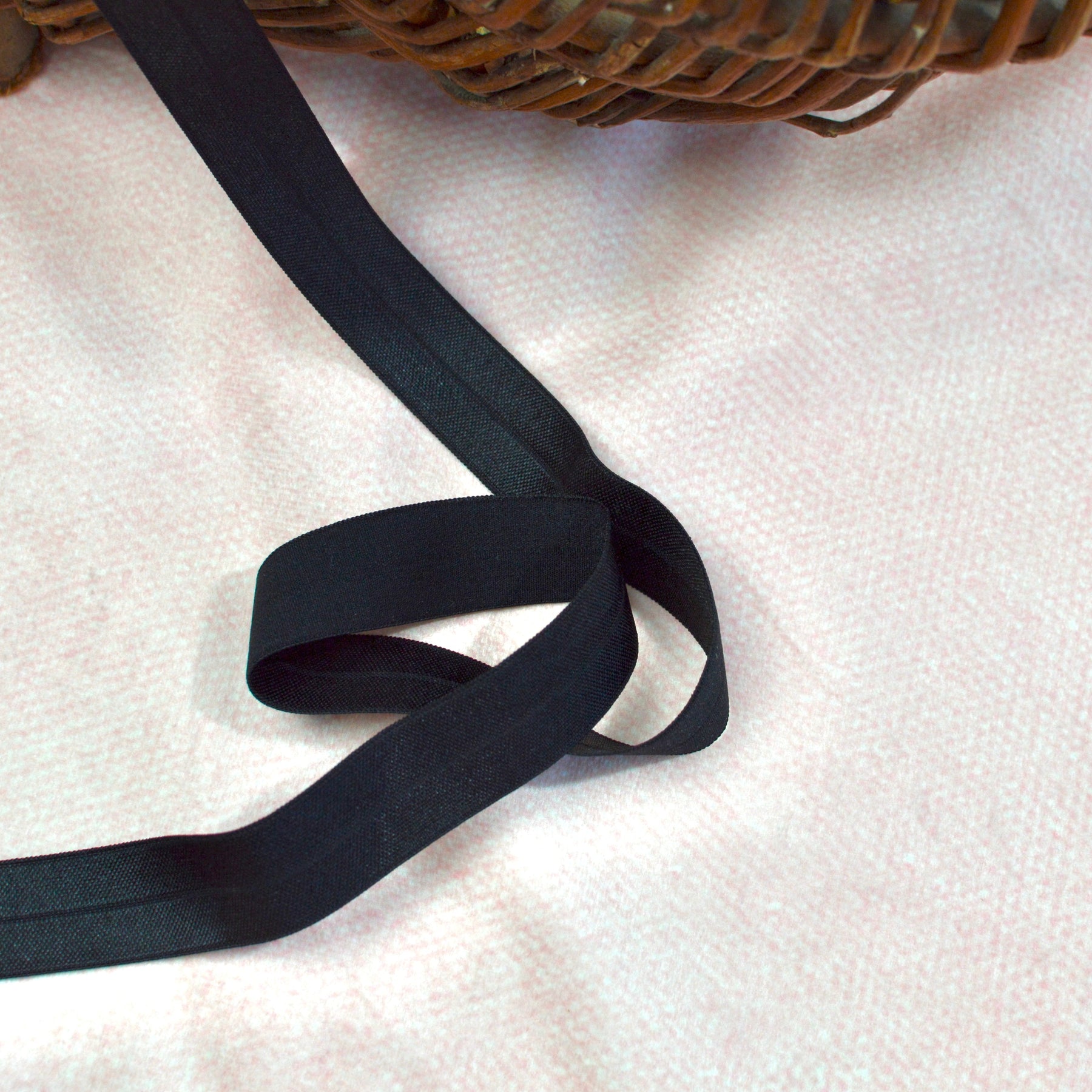 Faltgummi / Falzgummi / elastisches Einfassband 20m schwarz Fabric poshpinks