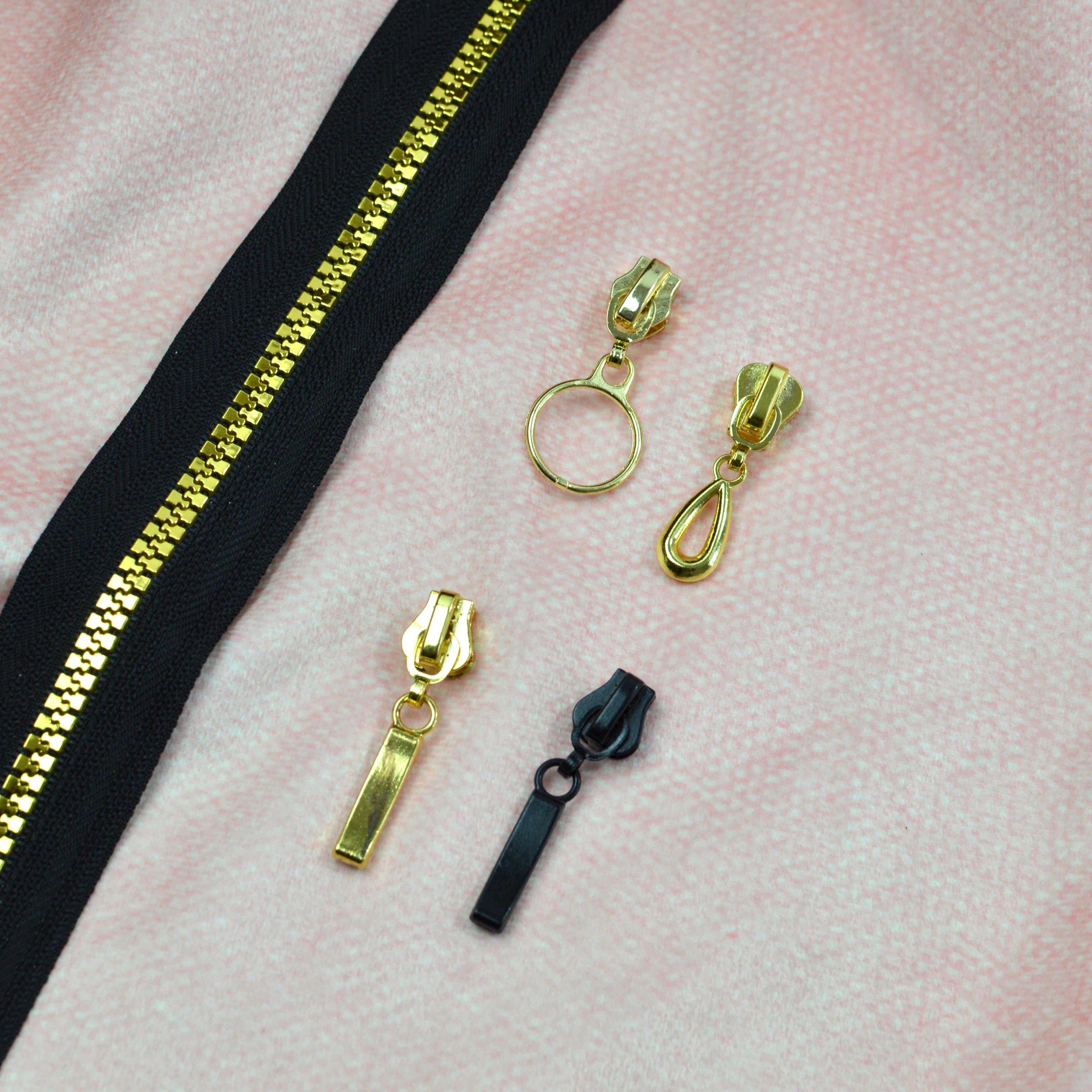 Endlosreißverschluss schwarz gold metallic - Meterware Fabric poshpinks