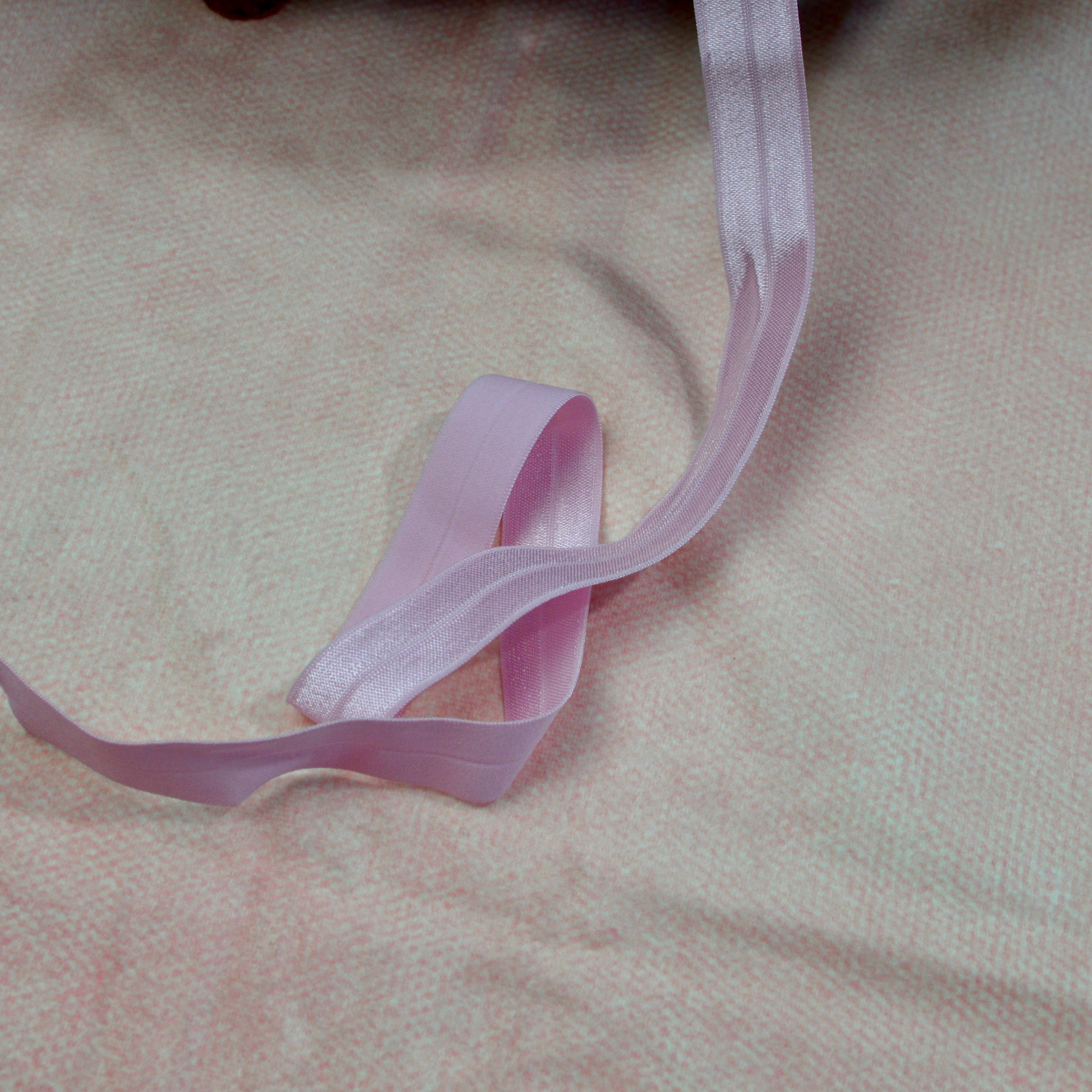 Faltgummi / Falzgummi / elastisches Einfassband 20m rosa Fabric poshpinks
