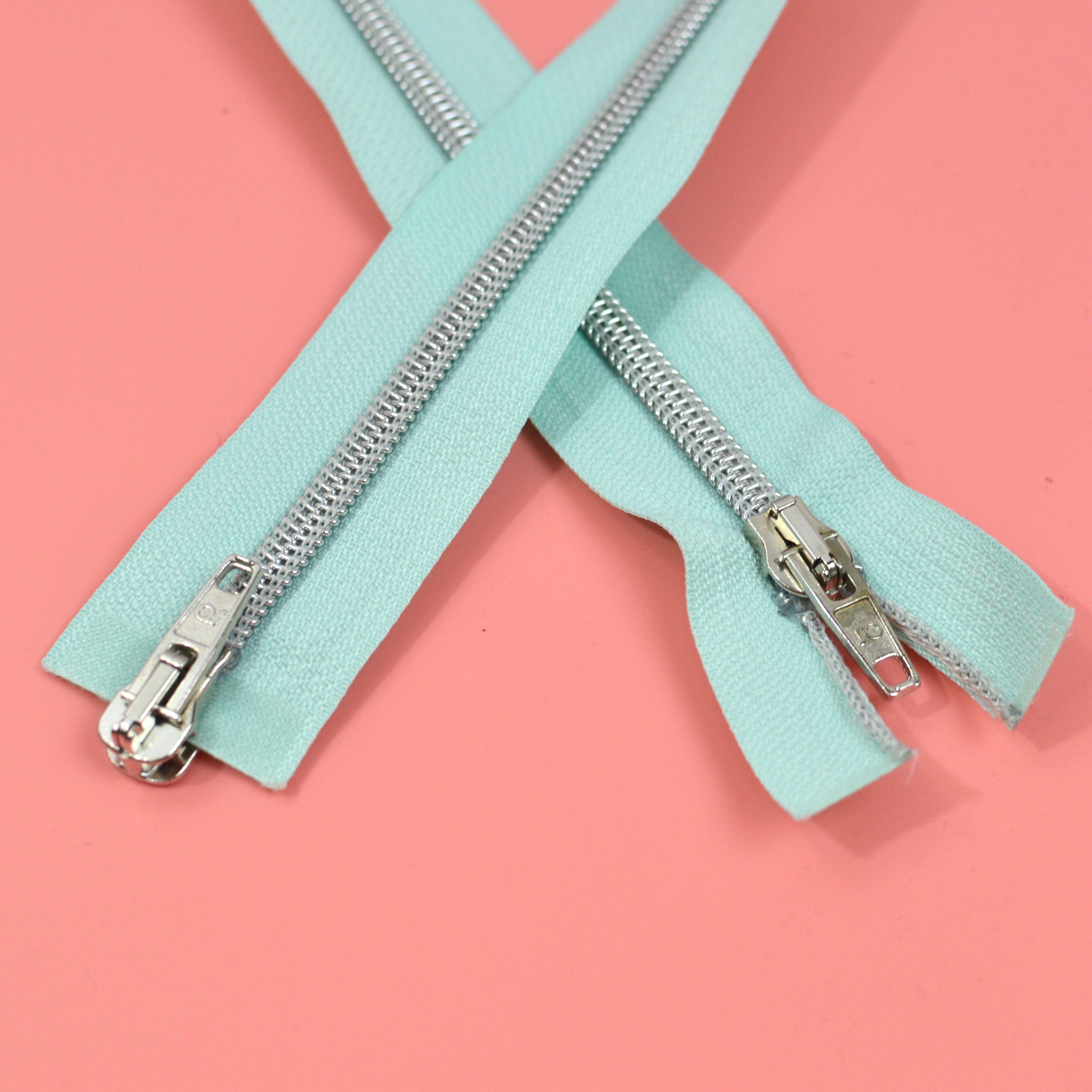 Jackenreißverschluss 2 Wege Koko 63 cm mint silber Kunststoff metalloptik Paket poshpinks