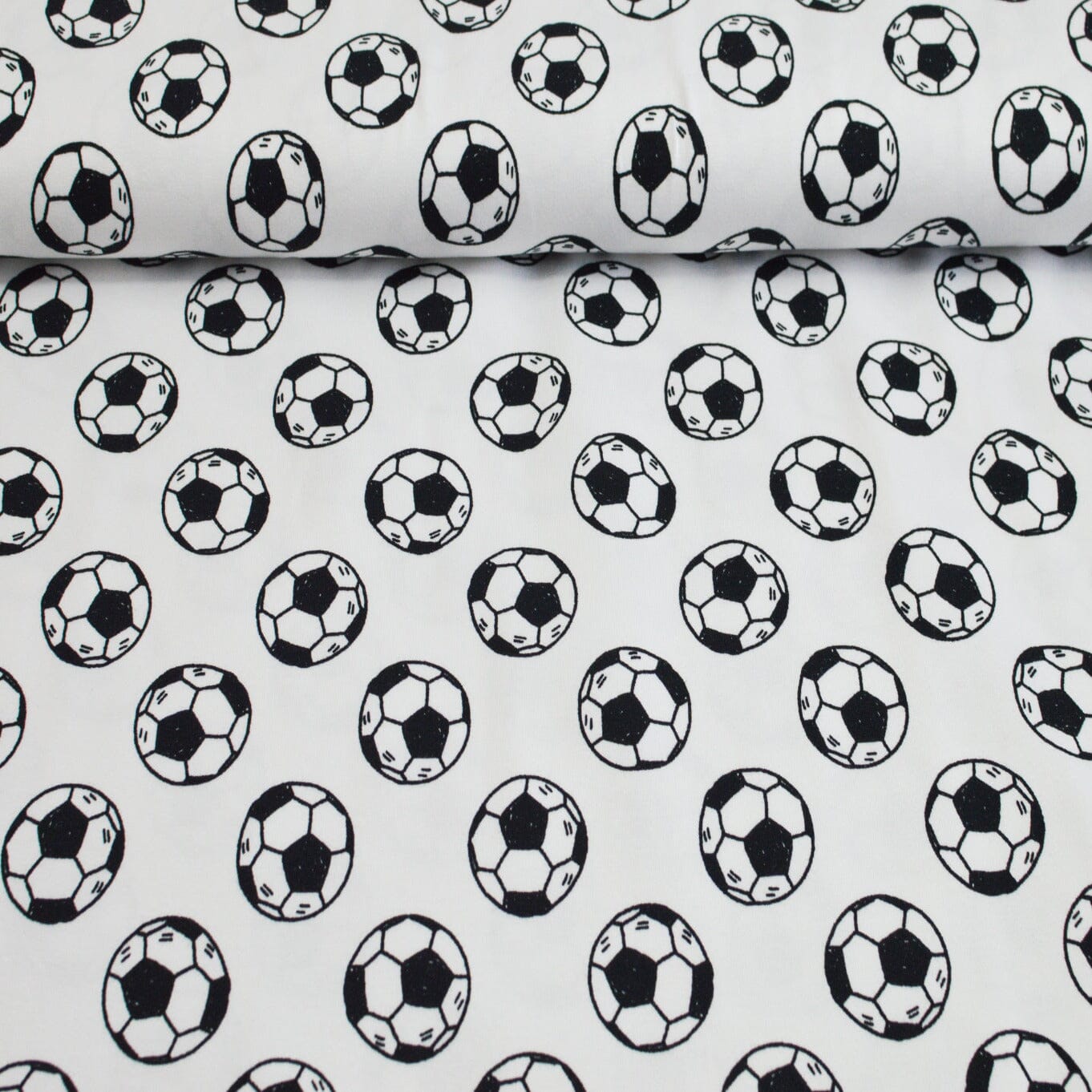 Reststück 1,0 m Baumwolljersey - Fußball schwarz auf weiß Stück poshpinks