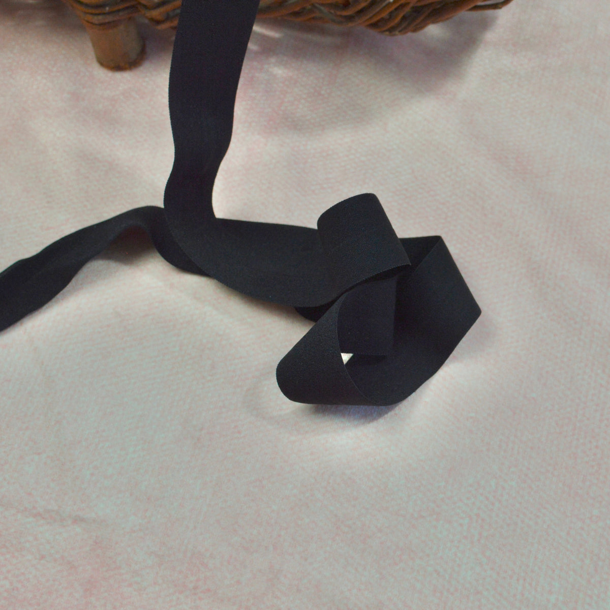 Faltgummi / Falzgummi / elastisches Einfassband 30m schwarz Fabric poshpinks