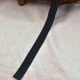 Faltgummi / Falzgummi / elastisches Einfassband 20m schwarz Fabric poshpinks